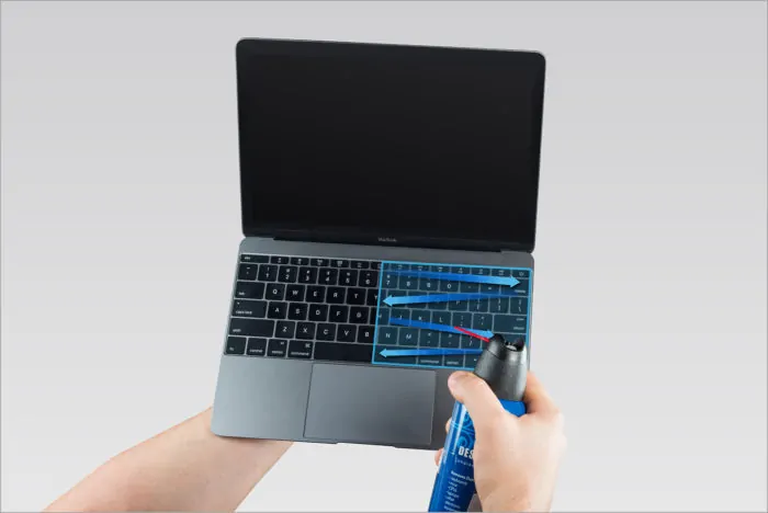 Cleaning Keyboard With Compressed Air Can